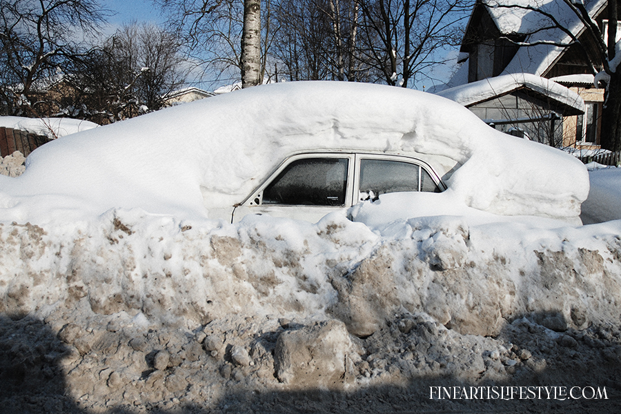 car covered with snow photo winter